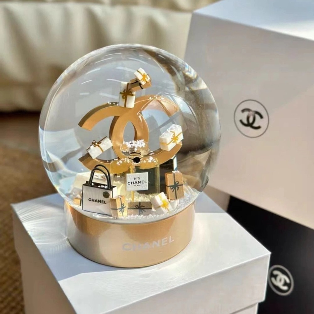CHANEL Gold and White Snow Globe